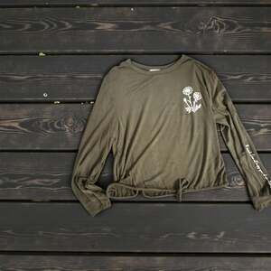 French Pastry Junior Long Sleeve Olive Green Wildflower Graphic Tie-Hem Top